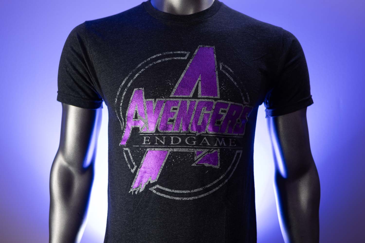Avengers logo printed in pink foil with glow-in-the-dark ink surrounding the design, created for a movie premiere to glow when the lights dim.